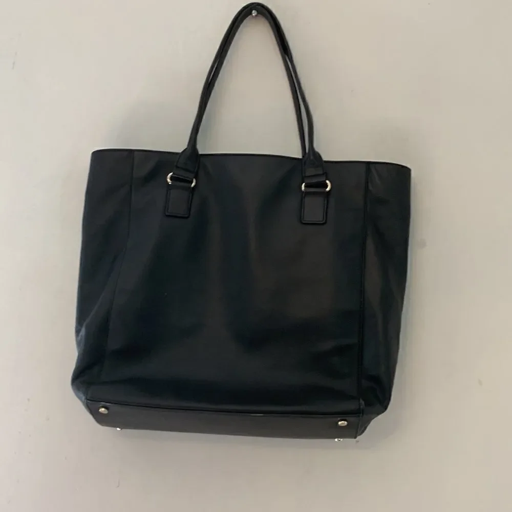 Kate Spade black leather tote bag with exterior and interior pockets